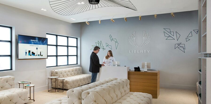 The Liberty Cannabis Lobby where Onward Content's videos currently play for a Dispensary Waiting Room Experience. Branding by Humankind Studio.